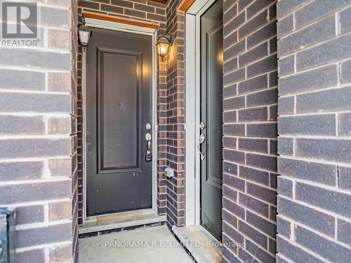 A black door is on the left and a white door is on the right.