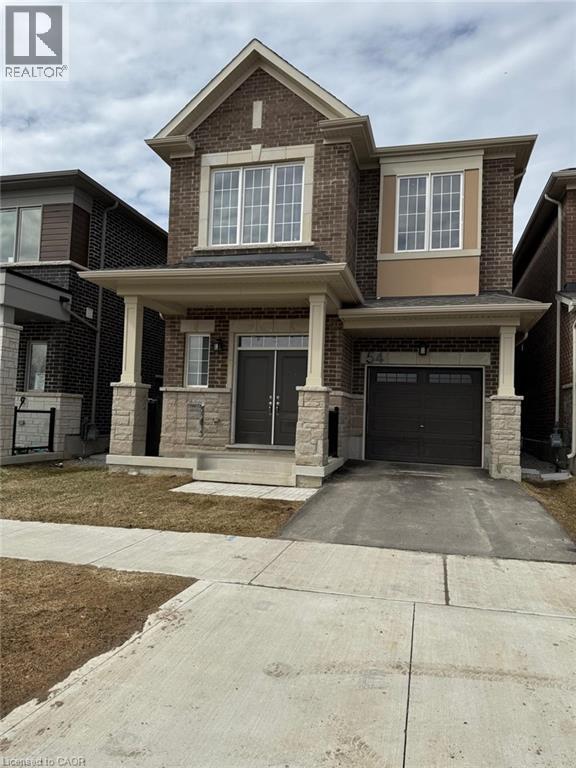A two-story house with a garage is for sale.
