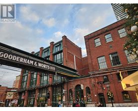 A building with the sign Gooderham & Worts Limited on it.