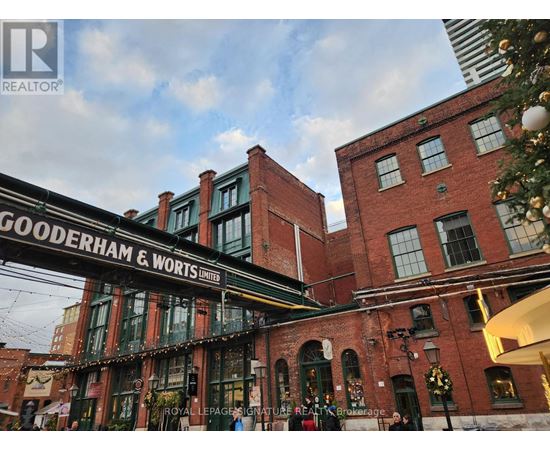 A building with the sign Gooderham & Worts Limited on it.