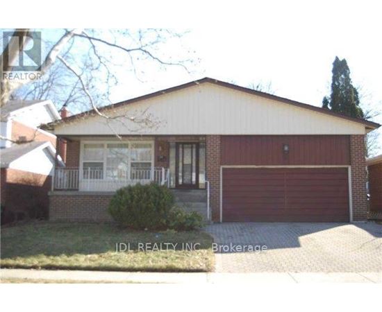 A house with a red garage door is for sale in Brokerage.