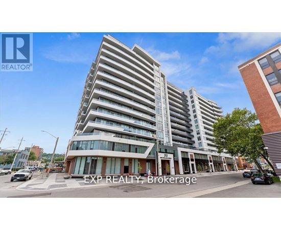 A tall, modern apartment building with the sign "EXP REALTY, Brokerage" in front.