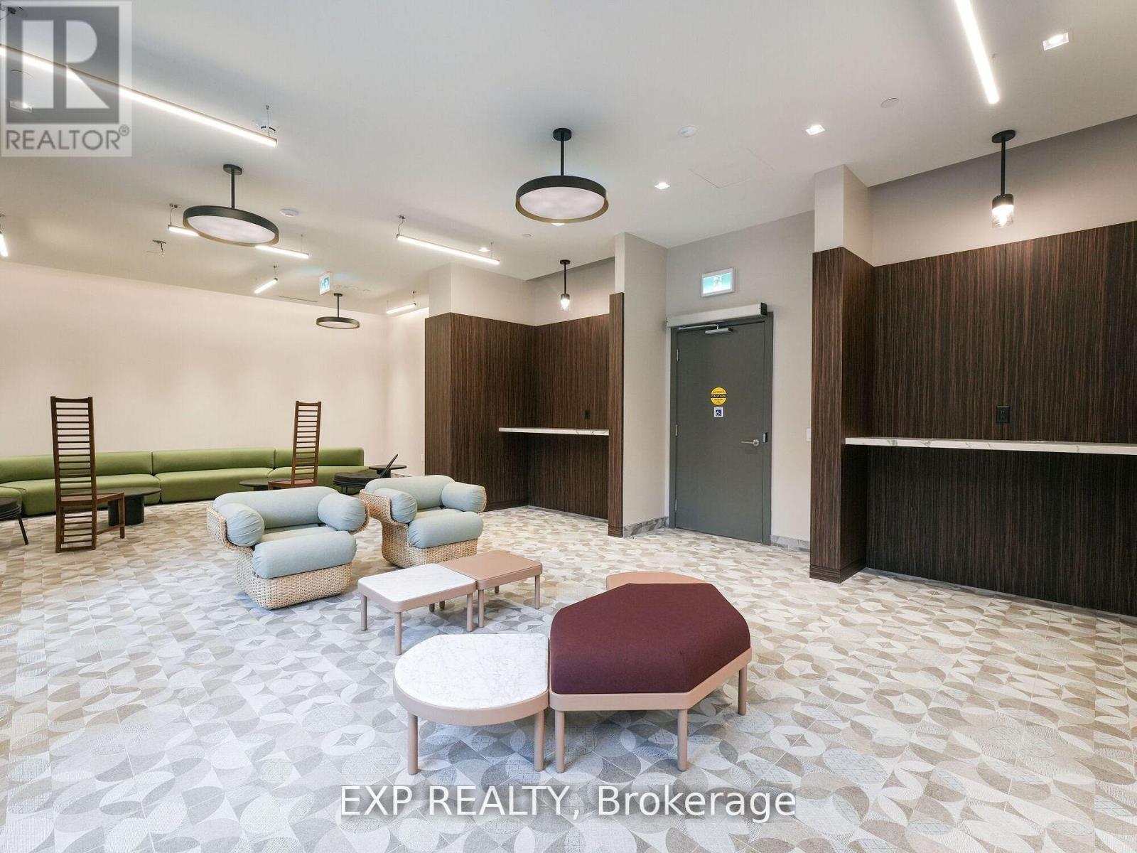 A spacious waiting area with a variety of seating options and a modern design.