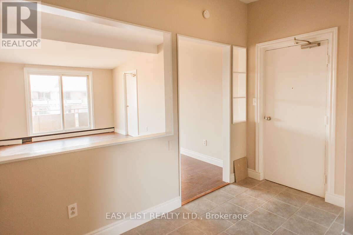 A room with a window and a door is on the market.