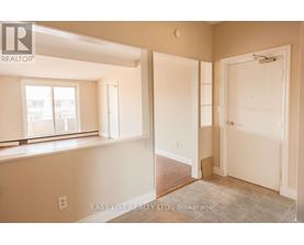 A room with a window and a door is on the market.