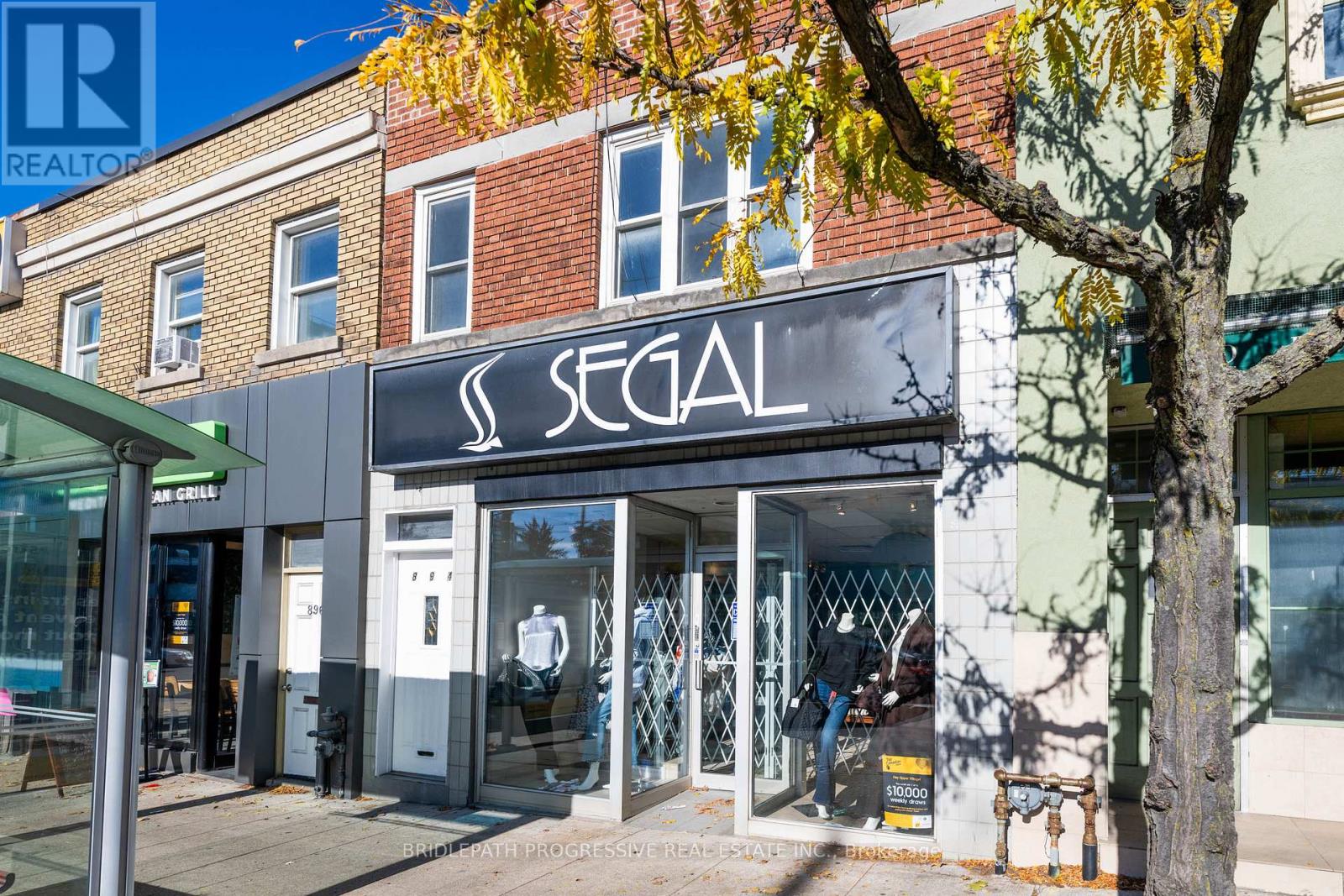 A storefront with the name SEGAL on the sign above the entrance.