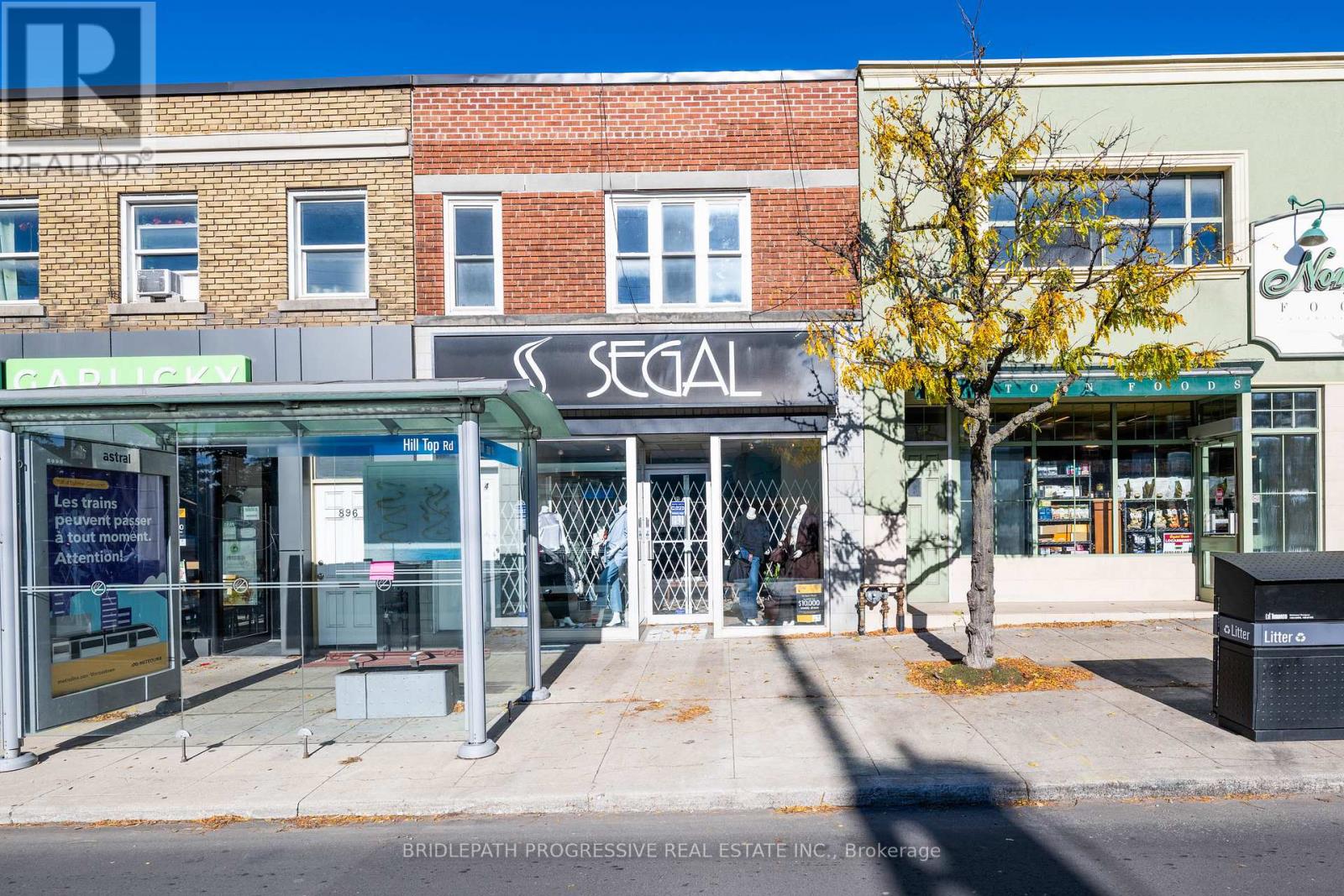 A storefront with a sign that says "STORE" is visible.