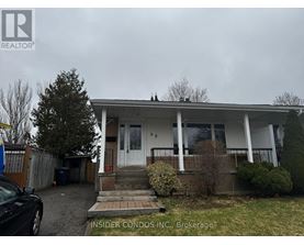 A house with a car parked in front of it.