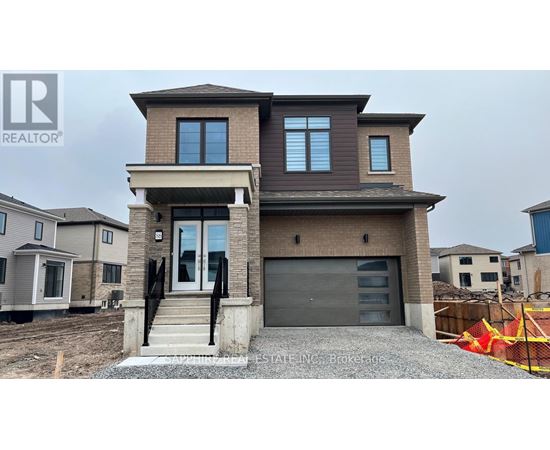 A modern two-story house with a garage is for sale.