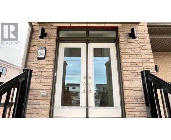 A real estate sign is on the front door of a house.