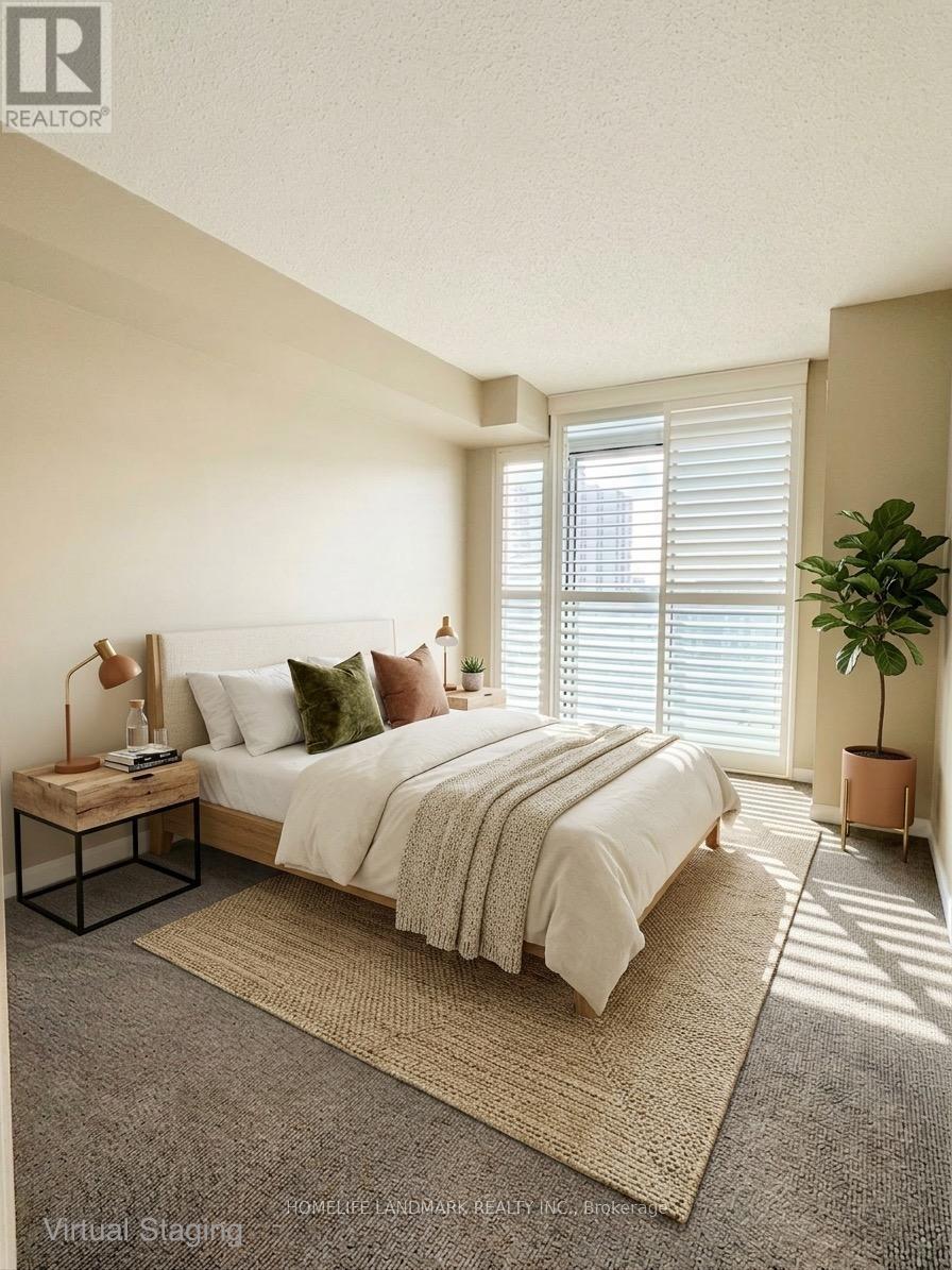 A bedroom with a bed, nightstand, and window with blinds.