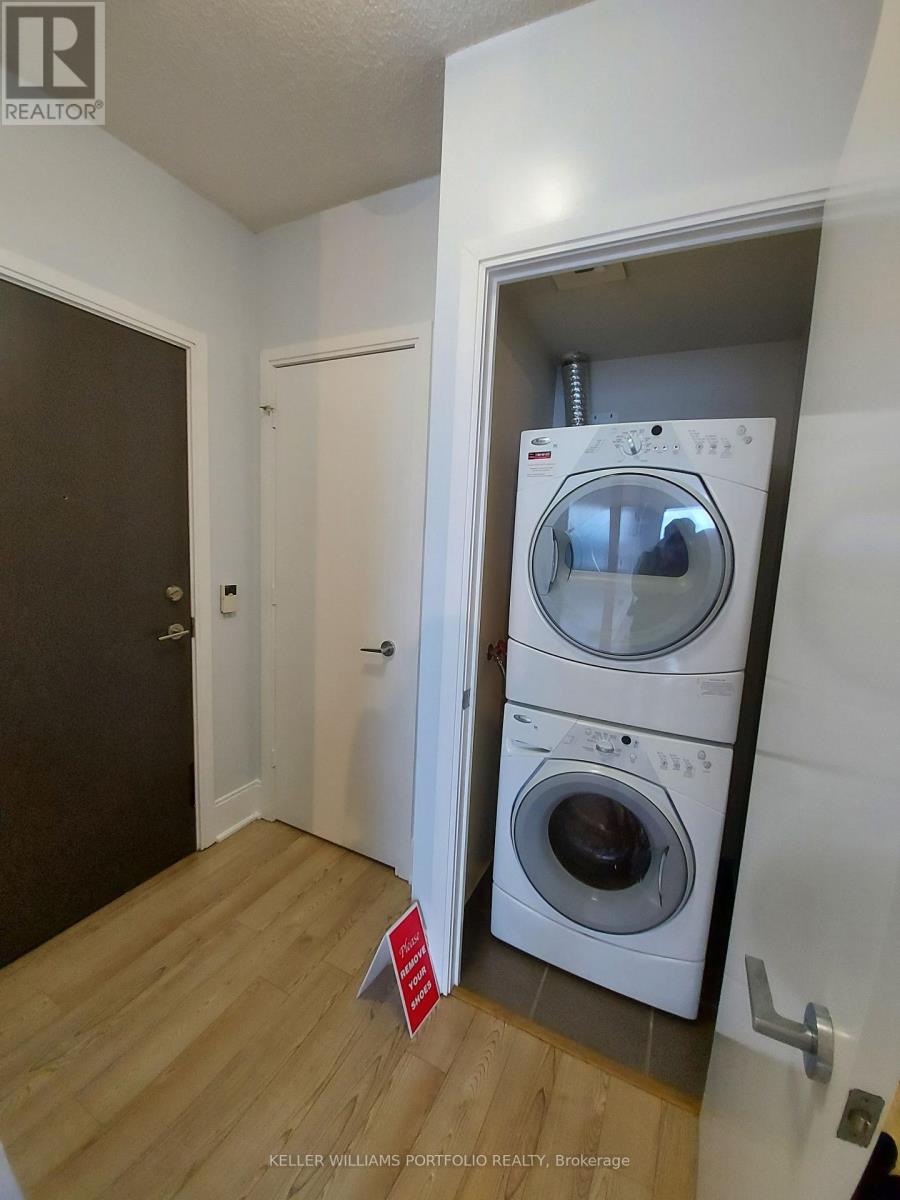 A realtor photo of a laundry room with a washer and dryer.