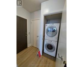 A realtor photo of a laundry room with a washer and dryer.