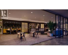 A modern dining area with people seated at tables.