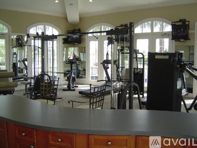 A gym with a variety of equipment is available for use.