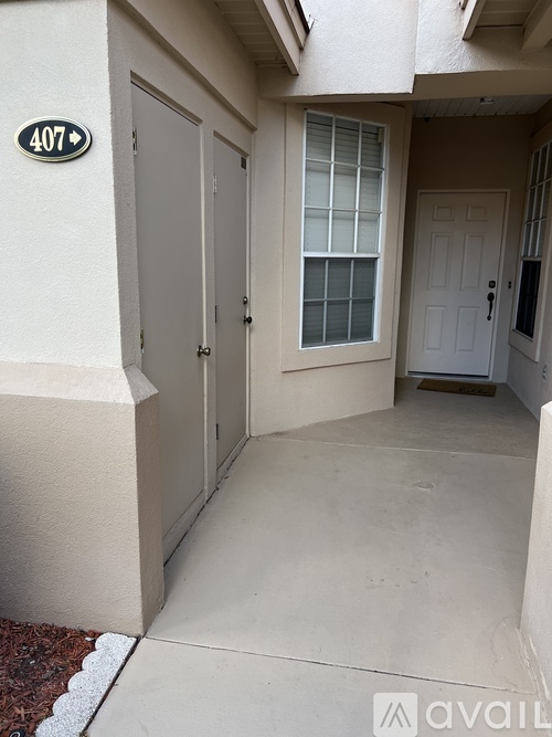 A white door is on the right side of the image.