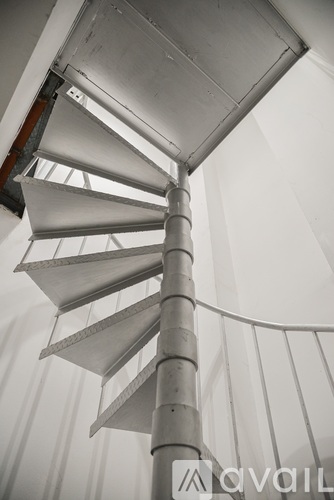 A spiral staircase in a building.