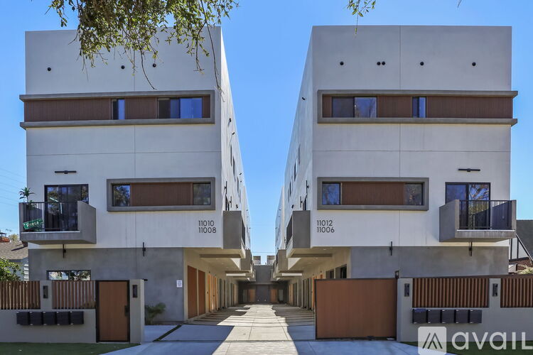 Two identical modern houses are available for rent.