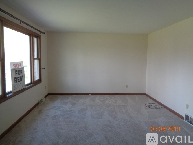 A room with a sign that says "For Rent" is available for rent.