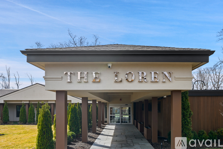 The Loren building has a covered walkway.