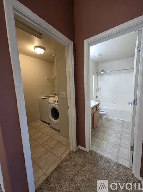 A laundry room with a washer and dryer.