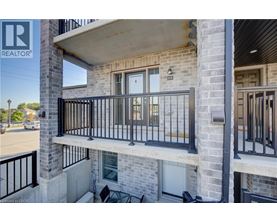 A balcony of a building with a REALTOR® logo.