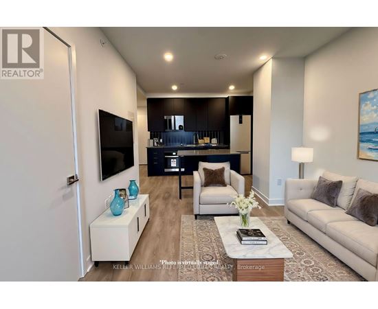 A modern living room with a flat screen TV and a coffee table.