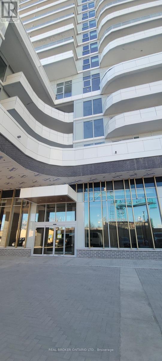 A modern building with a curved design and large windows.
