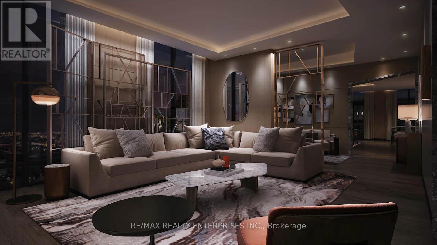 A modern living room with a large sectional sofa and a coffee table.