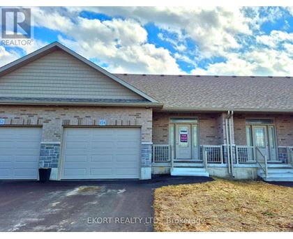 A house with a garage is for sale.