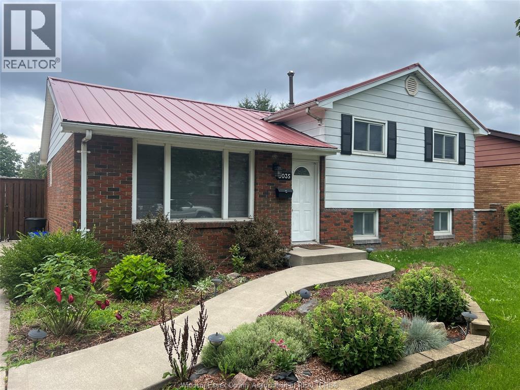 A house with a red roof and a white front door.
