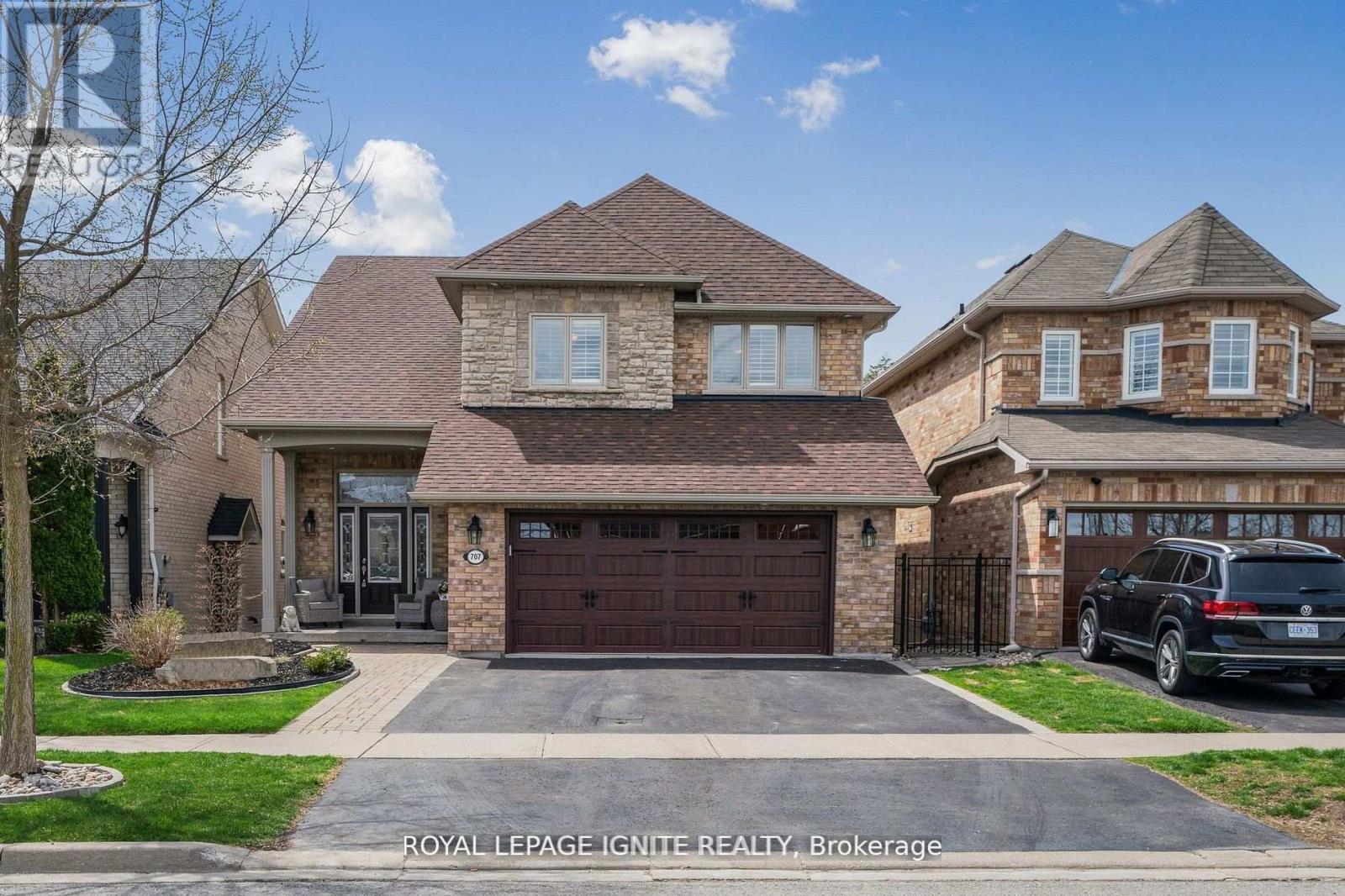 A large house with a garage is for sale.