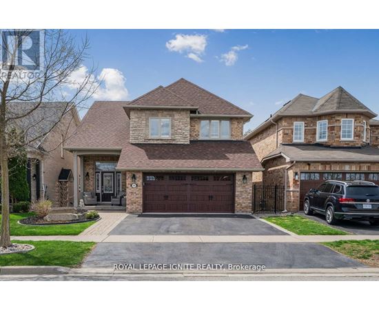 A large house with a garage is for sale.