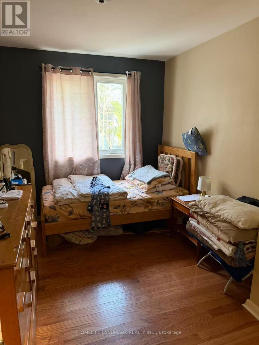 A bedroom with a bed and a bunk bed.