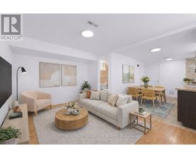A living room with a white couch, a coffee table, and a dining table.