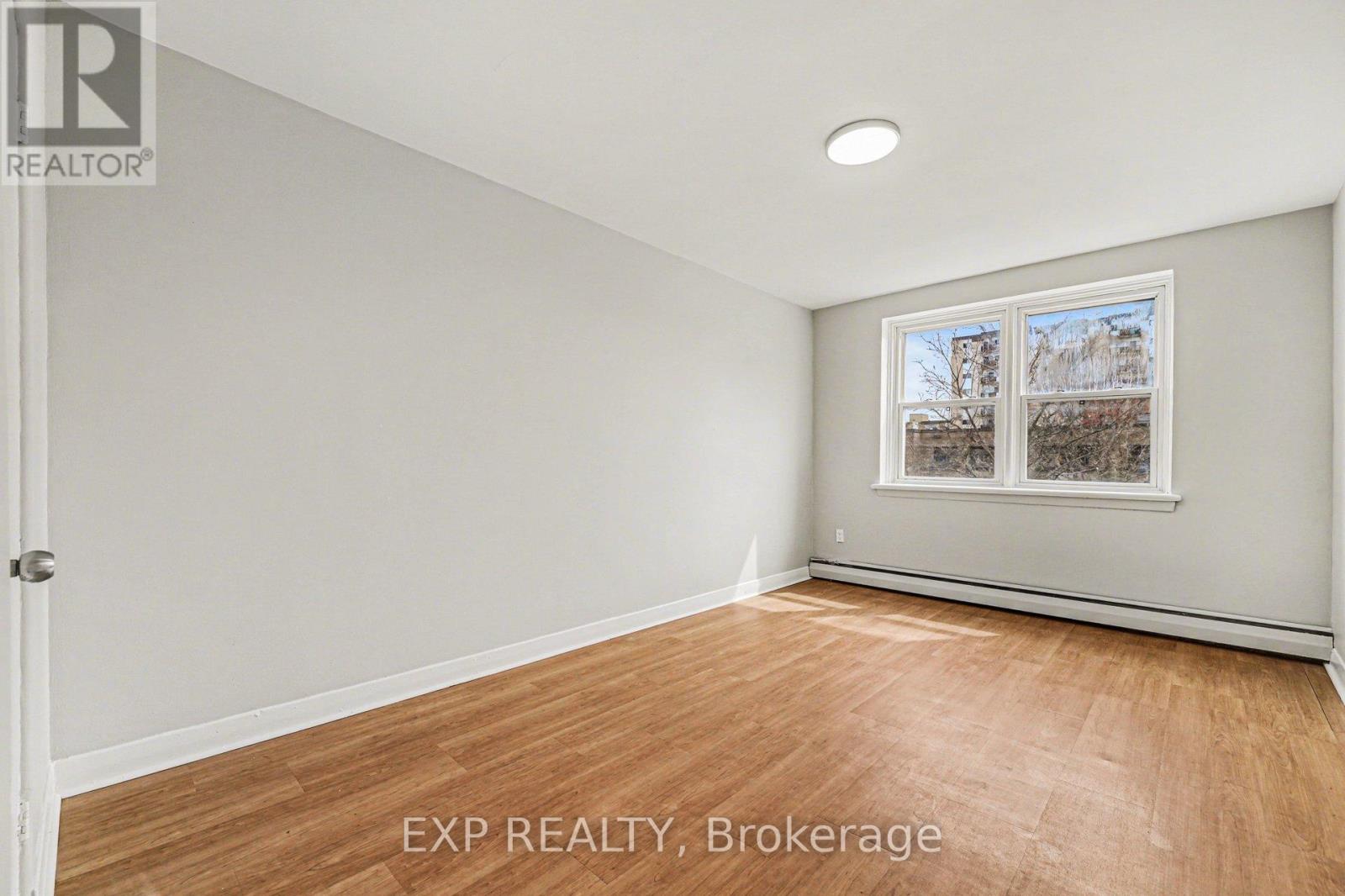 A room with EXP REALTY, Brokerage watermark.