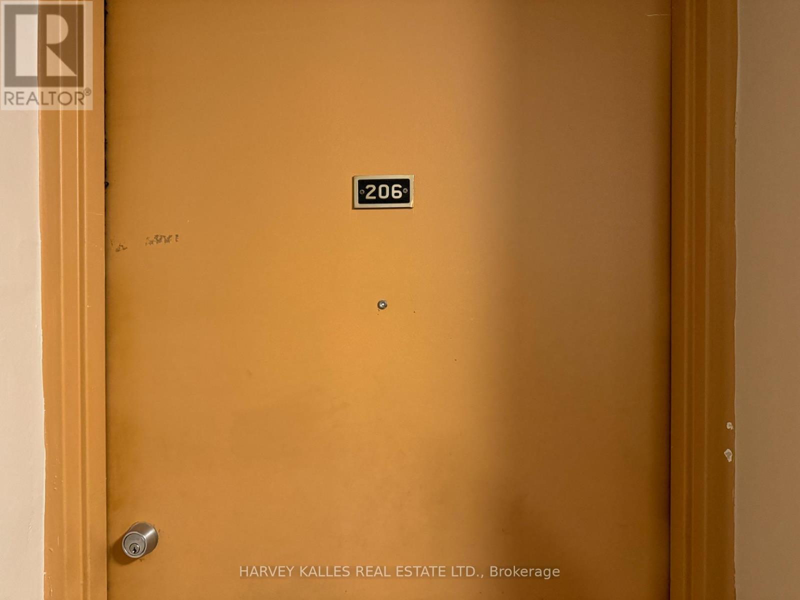 A door with a number 206 on it.