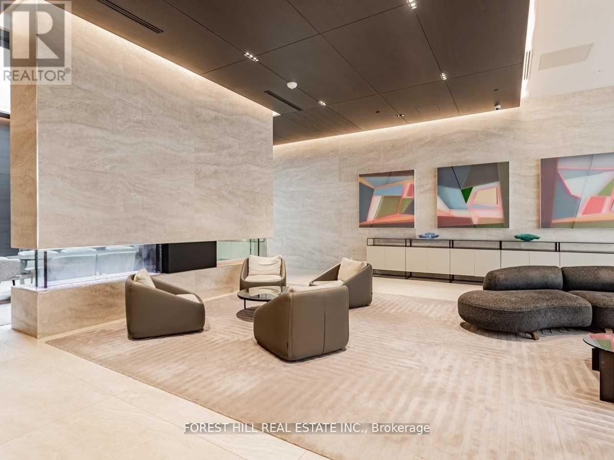 A spacious waiting area with modern furniture and artwork.