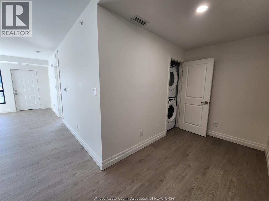 A room with a washer and dryer in it.
