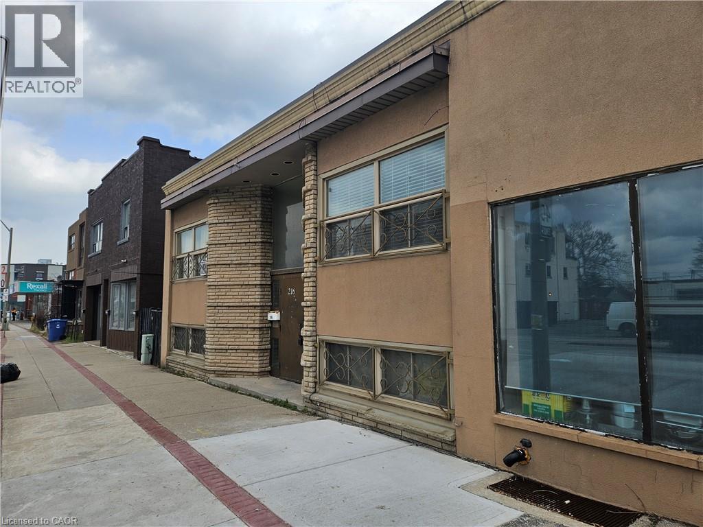 A building with a Realty sign on it.