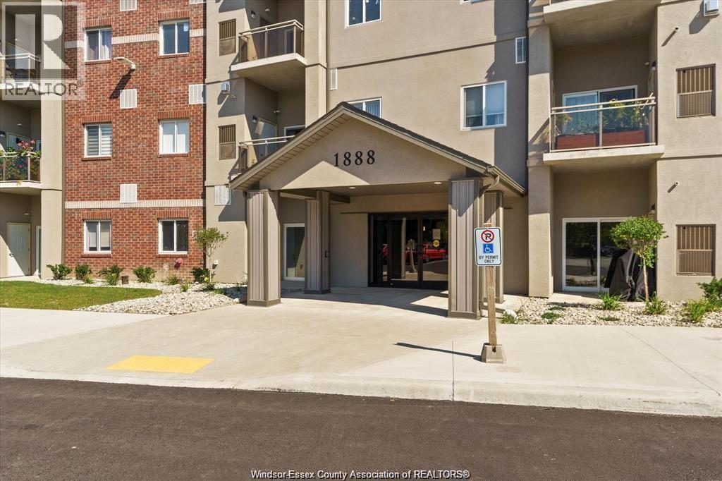 The entrance to apartment building number 1888 with a no parking sign in front.
