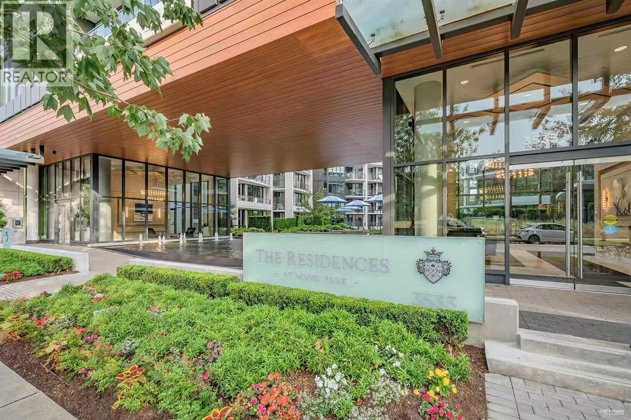 The Residences sign is in front of a building.