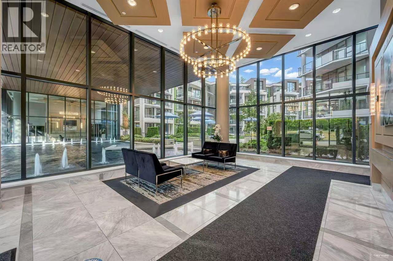 A large, modern living room with a piano and a chandelier.