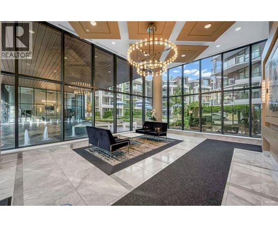 A large, modern living room with a piano and a chandelier.