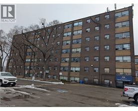 A large brick building with the number 468 on it.