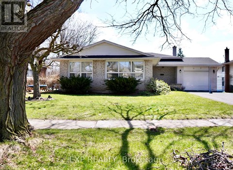 A house with a tree in front of it.