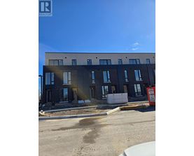A building under construction with a sign that says "EXP REALTY Brokerage".