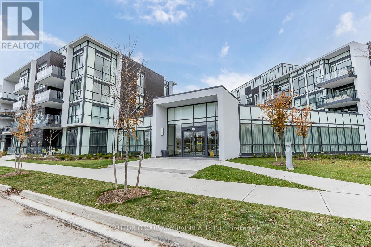 A modern building with glass windows and a sign that reads "REALTOR" in the foreground.