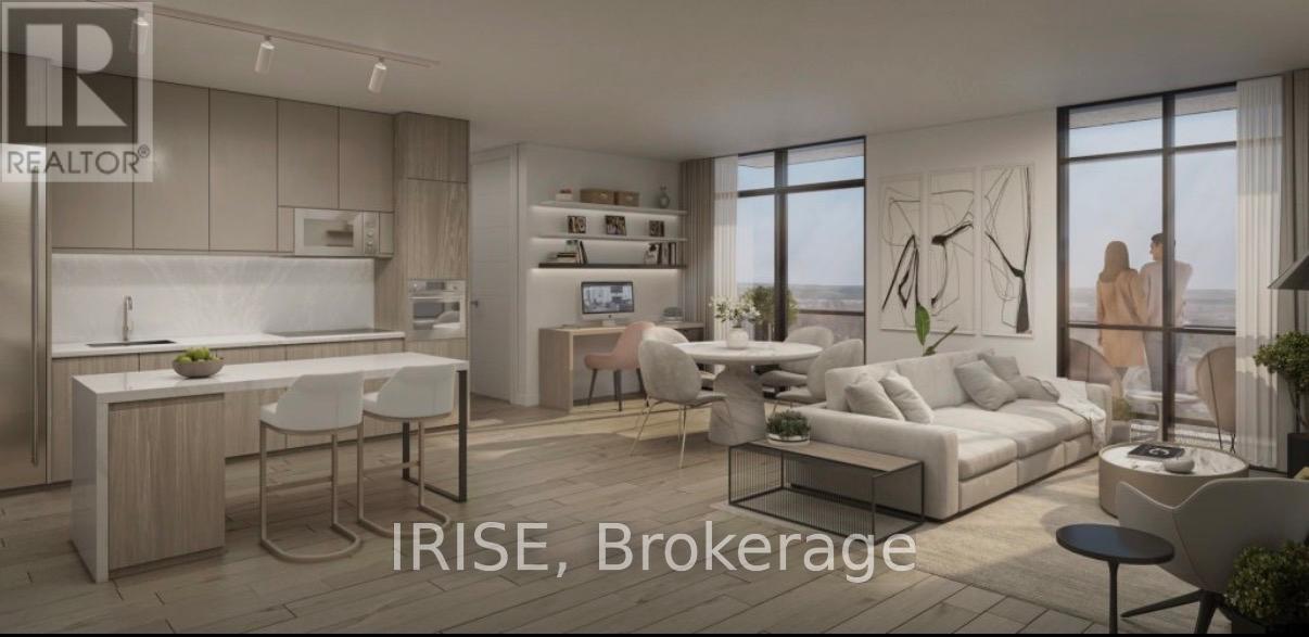 A modern living room with a kitchen area in the background.