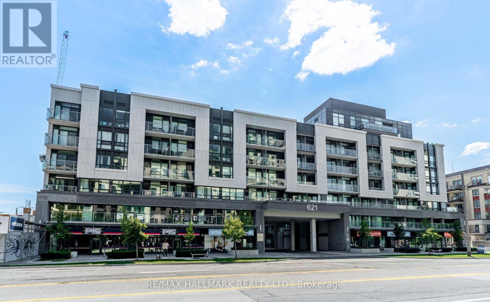 A modern multi-story building with the number 621 on the front.